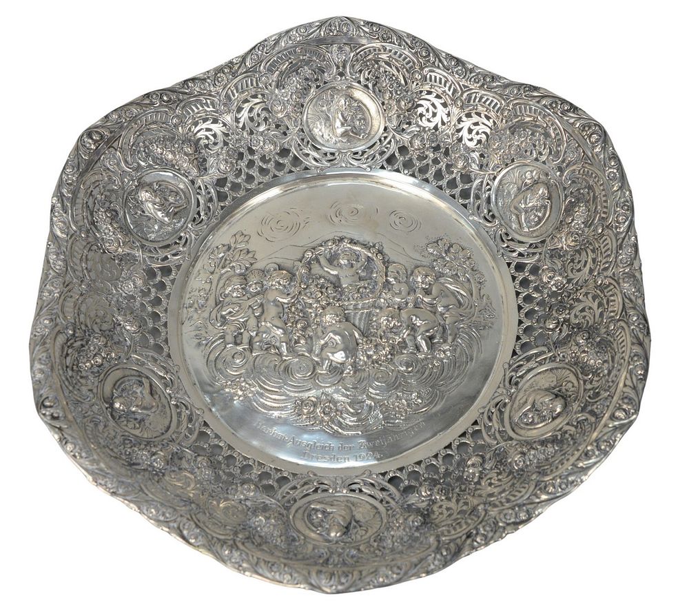 Appraisal: German Silver Reticulated Bowl with embossed Putti design marked Dresden