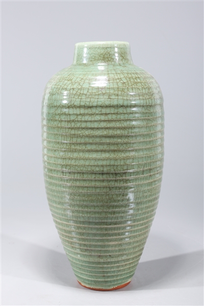 Appraisal: Chinese celadon crackle glazed vase with ribbed design to body