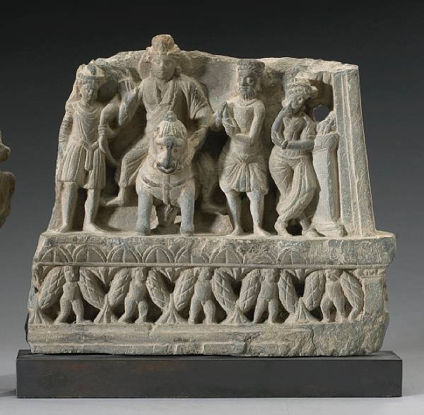 Appraisal: A grey schist frieze fragment Gandharan nd rd Century CE