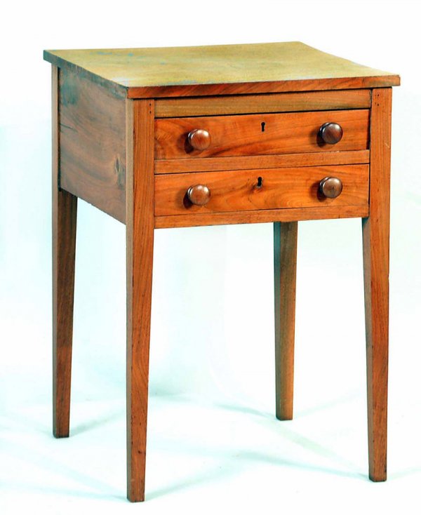 Appraisal: A straight leg two drawer mixed wood work or sewing