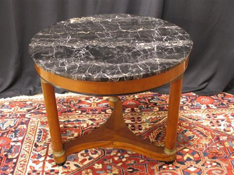 Appraisal: EMPIRE STYLE MARBLE FRUITWOOD CENTER TABLE Twentieth century the round