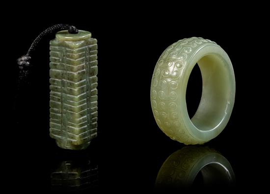 Appraisal: Sale Lot Two Celadon Jade Pendants the first in the