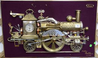 Appraisal: Three dimensional brass train collage signed Paul Kahn St Quen