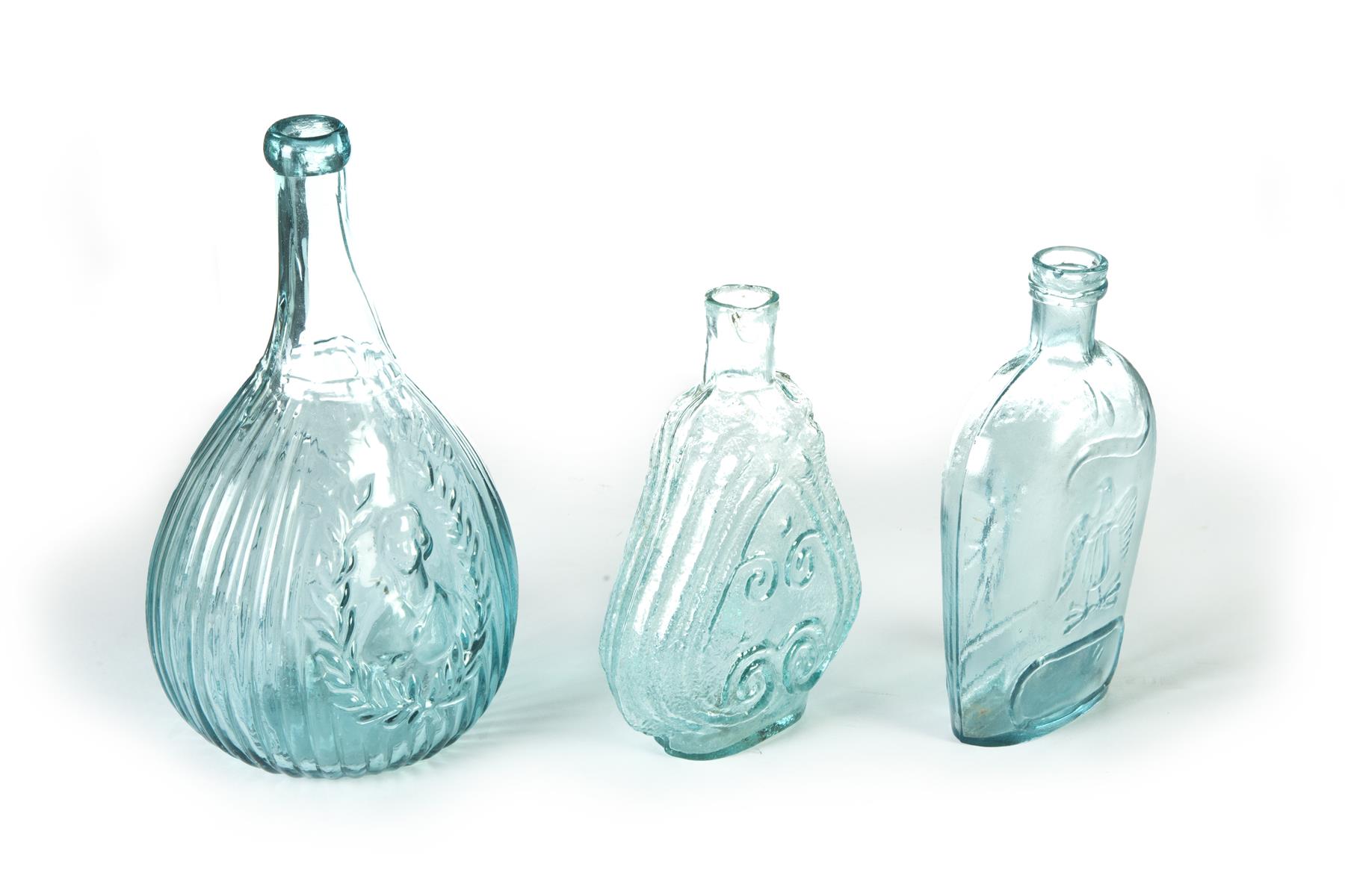 Appraisal: THREE BLOWN AQUA GLASS BOTTLES American nd quarter- th century