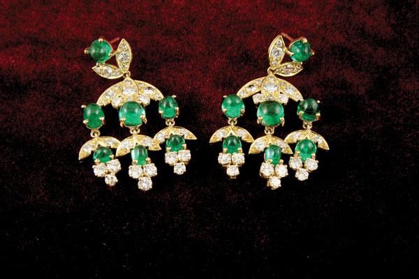 Appraisal: A pair of Diamond and Emerald Ear Pendants each claw-set