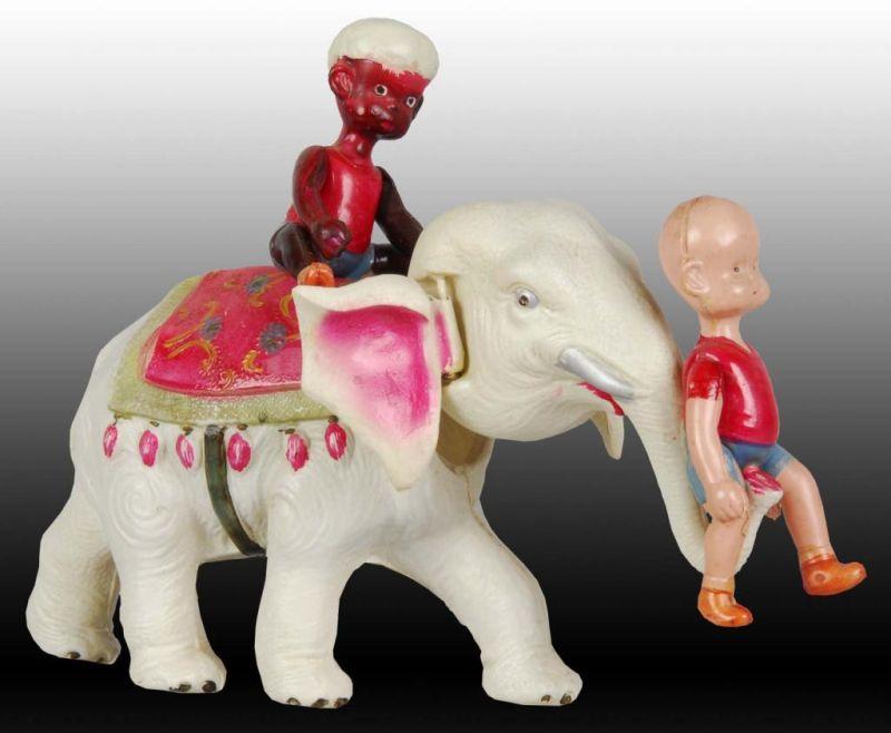 Appraisal: Pre-War Japanese Celluloid Henry on Elephant Toy Description Wind-up Working