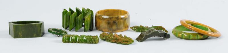 Appraisal: One green marbled elastic bracelet two marbled bangles one carved