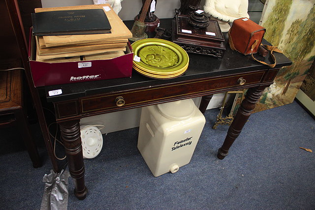 Appraisal: A VICTORIAN BLACK MARBLE TOPPED MAHOGANY SIDE TABLE with brass