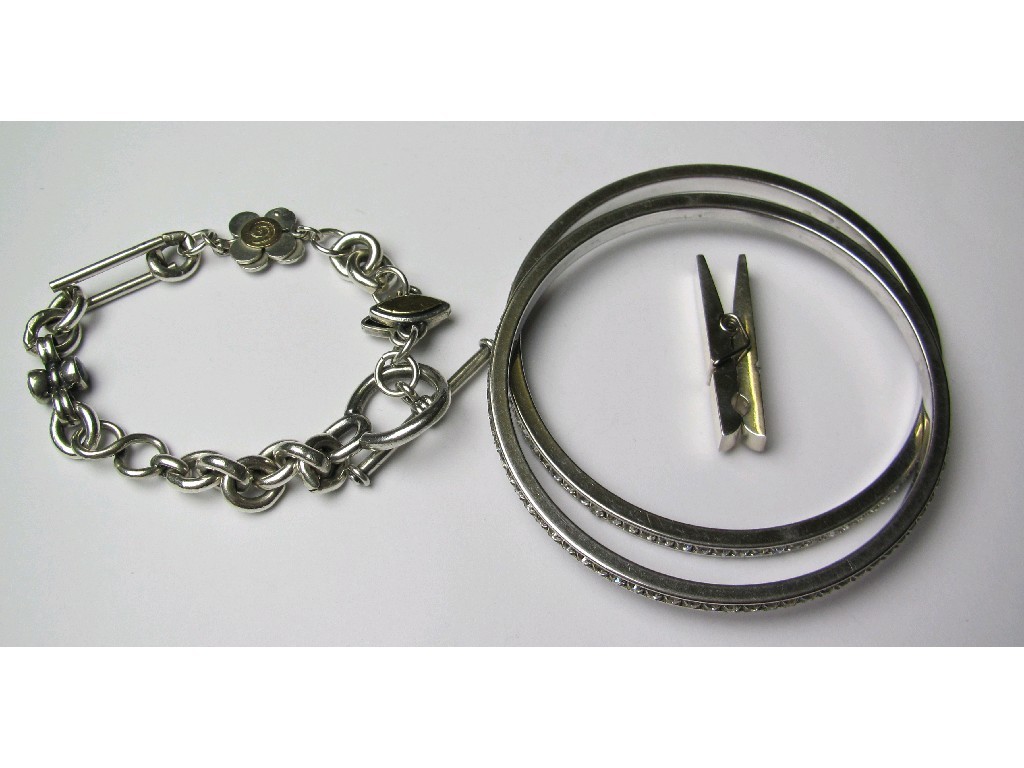 Appraisal: Lot comprising a silver bracelet silver peg and two white