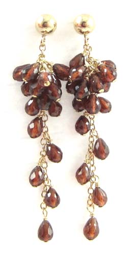 Appraisal: PAIR OF GARNET DANGLE EARRINGS each k yellow gold with