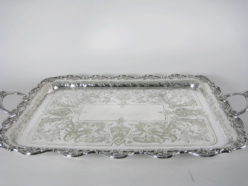 Appraisal: A large plated two handled Tea Tray with leafage engraving