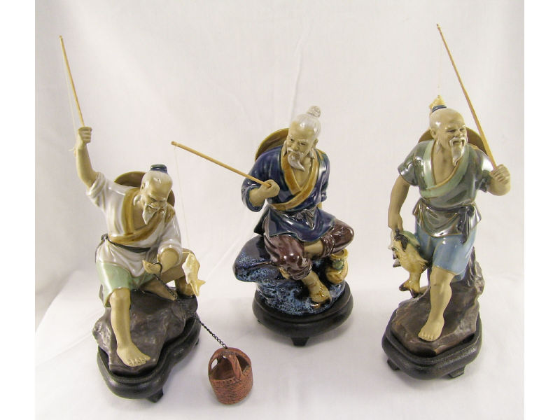 Appraisal: - Oriental Mudmen Fisherman Figures Three porcelain male Oriental style