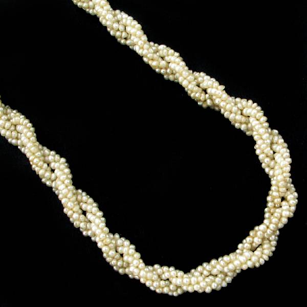 Appraisal: A strand of twisted seed pearls necklace length in