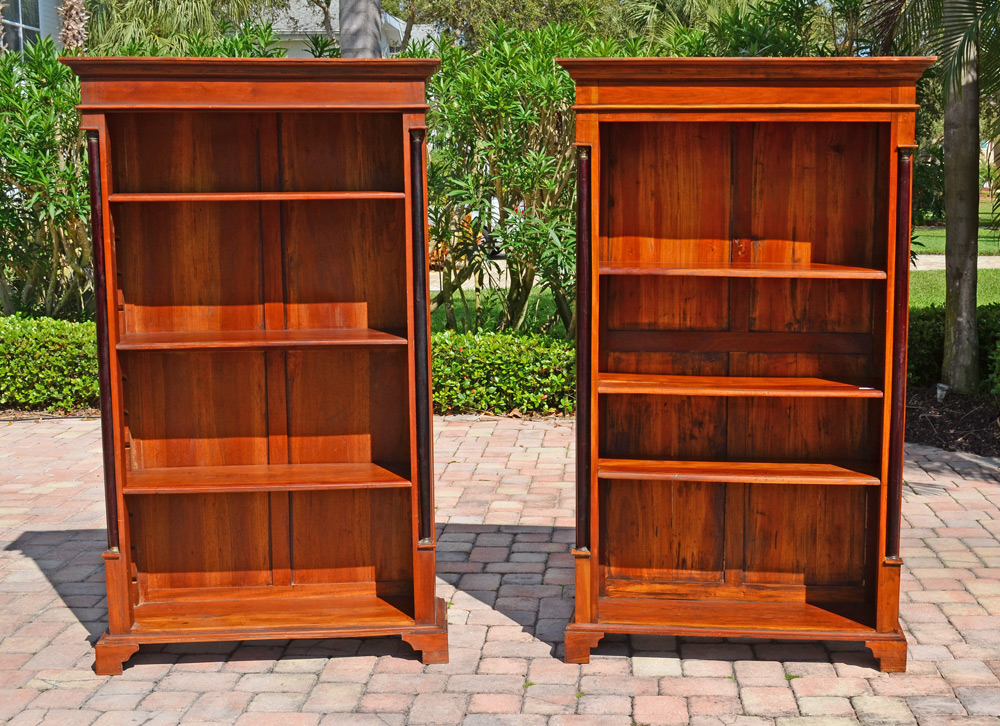 Appraisal: PAIR OF CHERRY BOOK CASES Each with ebonized full column