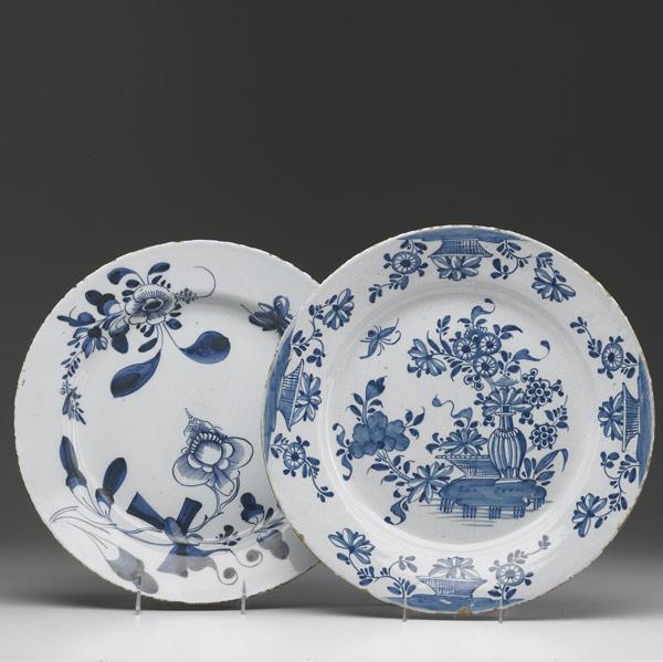 Appraisal: ENGLISH DELFT Two chargers one Lambeth and one Bristol both