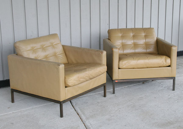 Appraisal: Pair Florence Knoll leather upholstered arm chairs on bronze frame