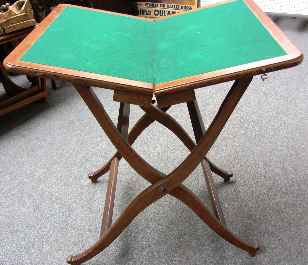 Appraisal: A patent oak folding games table with Maple Co label