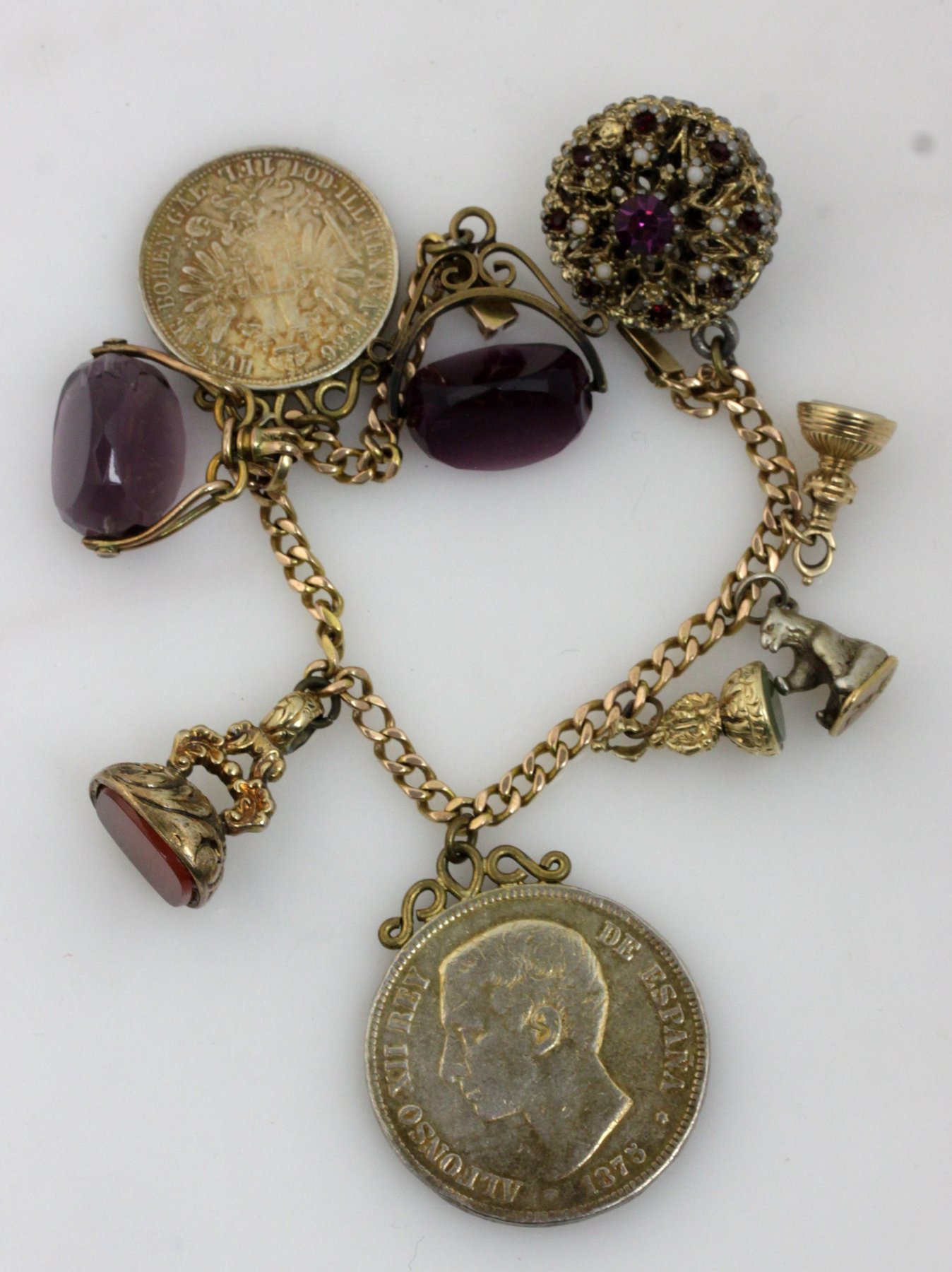 Appraisal: A flattened curb-link bracelet hung with an Austro-Hungarian Florin various