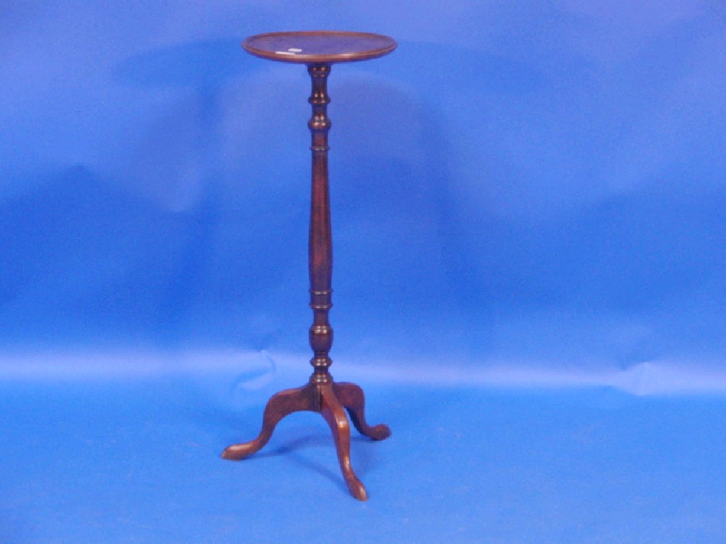 Appraisal: A mahogany torchere