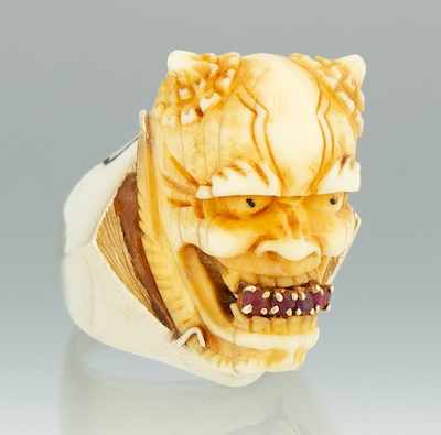 Appraisal: A Gentleman's Carved Ivory Demon Mask Ring in Gold k