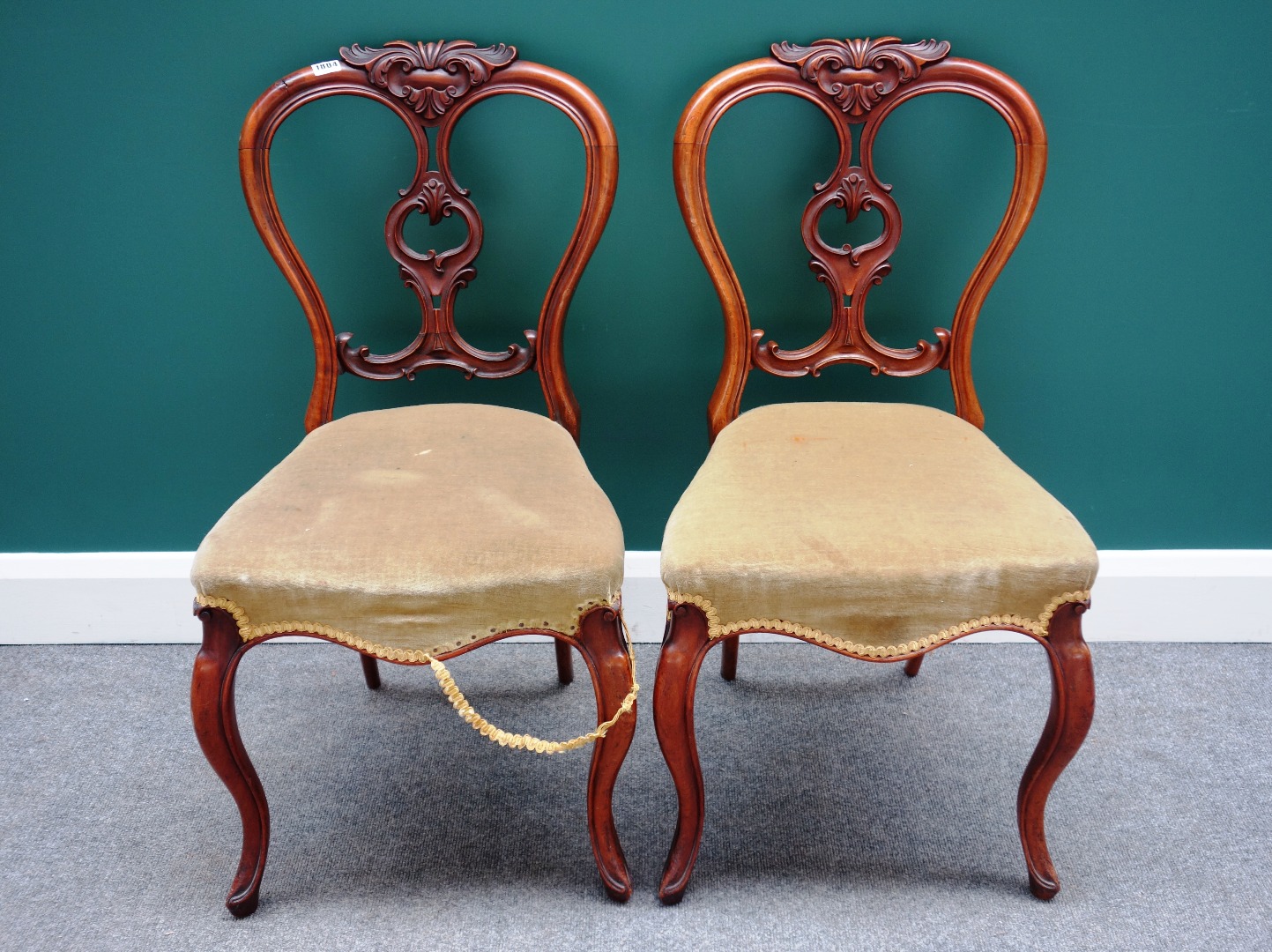 Appraisal: A set of five Victorian walnut framed dining chairs with