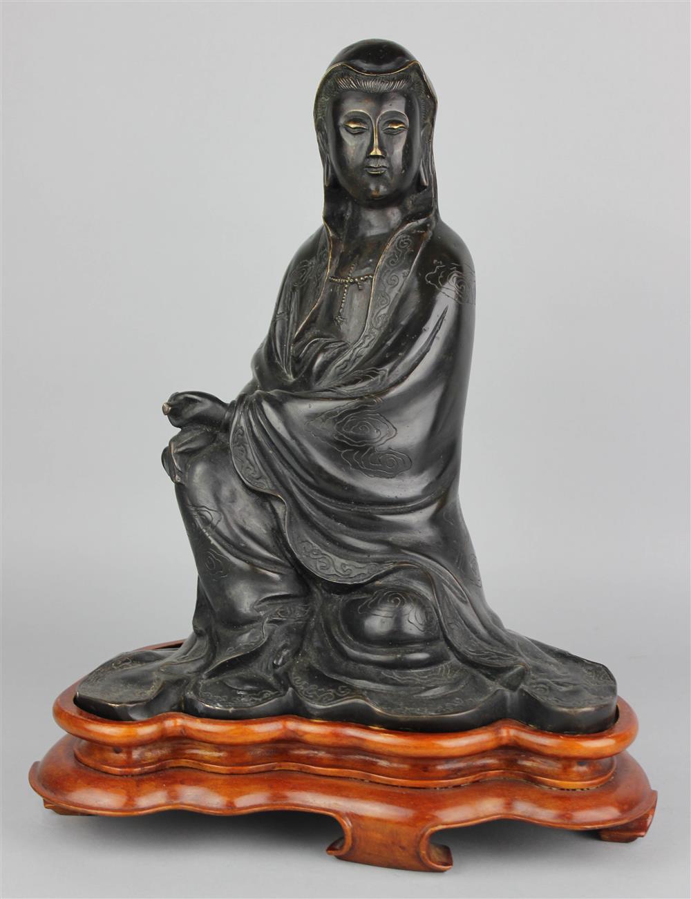 Appraisal: CHINESE BRONZE FIGURE OF GUANYIN DAOGUANG TWO-CHARACTER SEAL MARK the