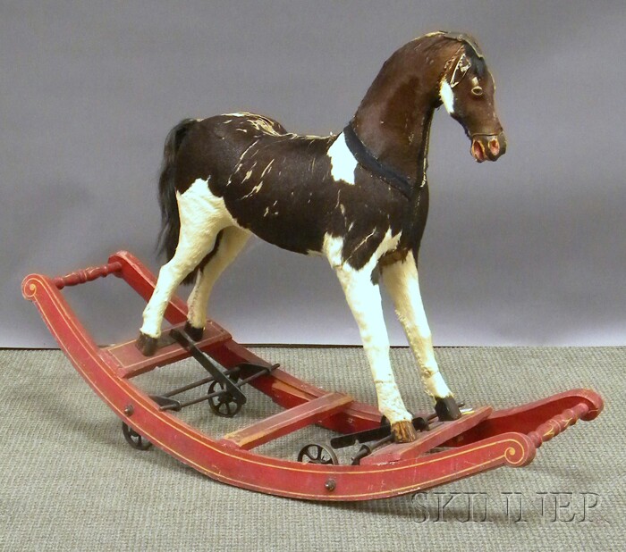 Appraisal: Late Victorian Hide-clad Rocking Horse with Red-painted Wood Rockers attached