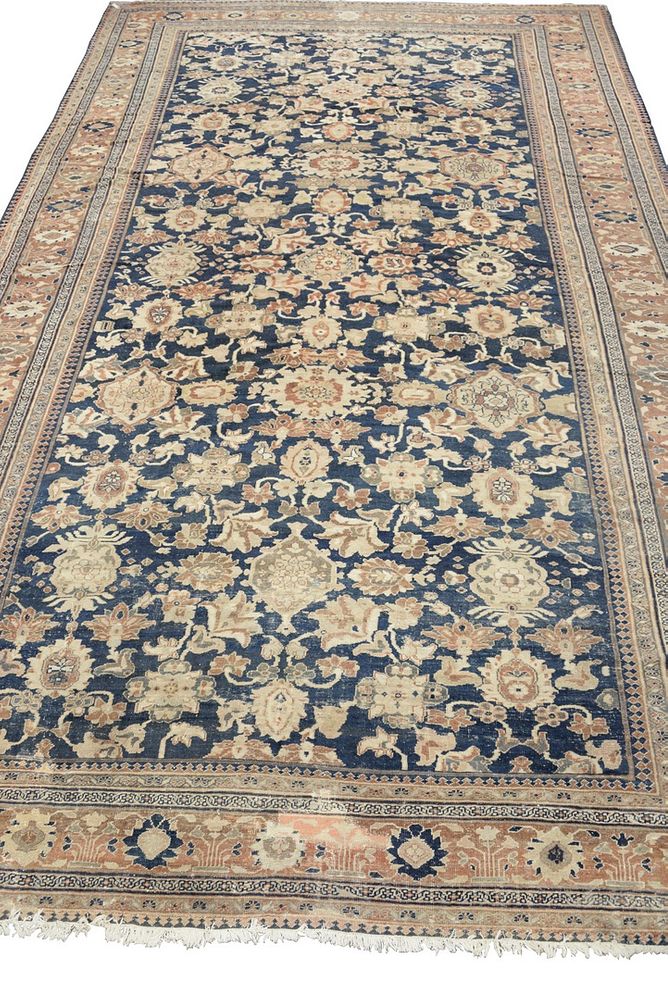 Appraisal: Oushak Oriental Carpet with wear cut and patched ' x