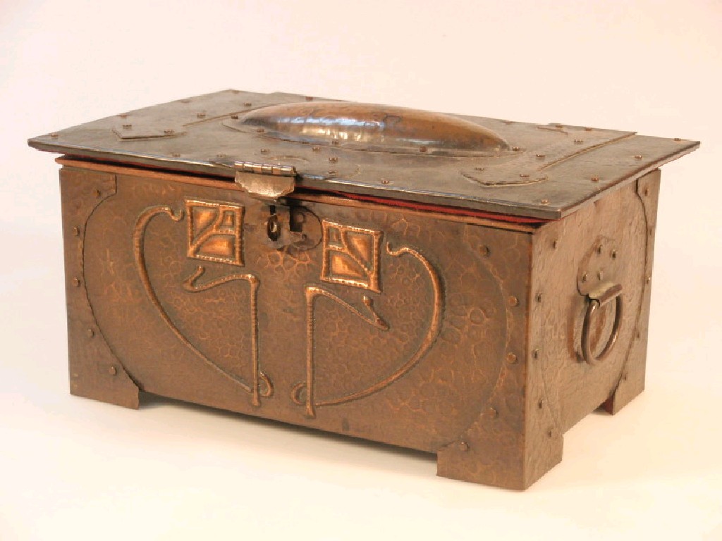 Appraisal: An Arts Crafts beaten copper casket rectangular with strap work