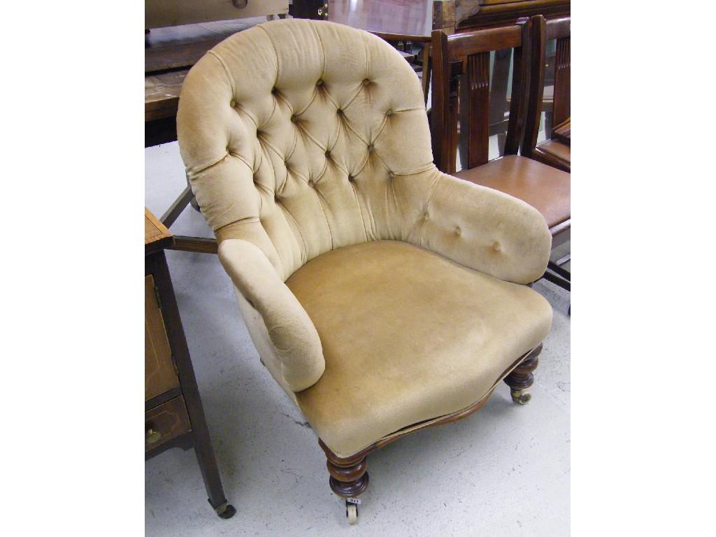 Appraisal: Victorian button back nursing chair with cream upholstery upon turned