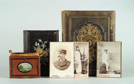 Appraisal: THREE PHOTOGRAPH ALBUMS Two with carte de visite s tintypes