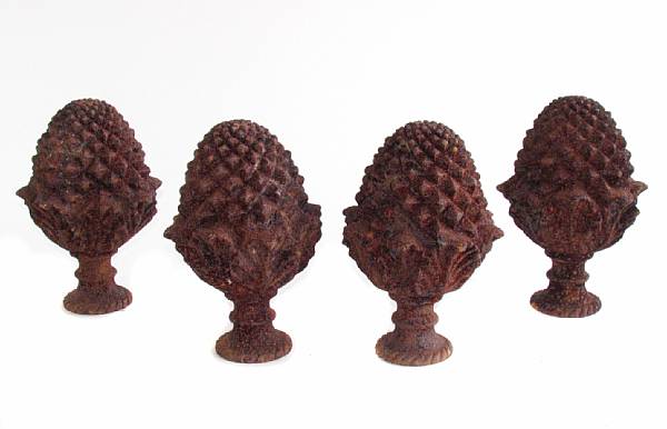 Appraisal: A group of four cast iron finials height in diameter