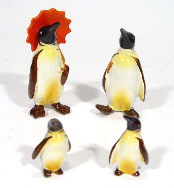 Appraisal: Hand painted family of four Beswick penguins one clutching a