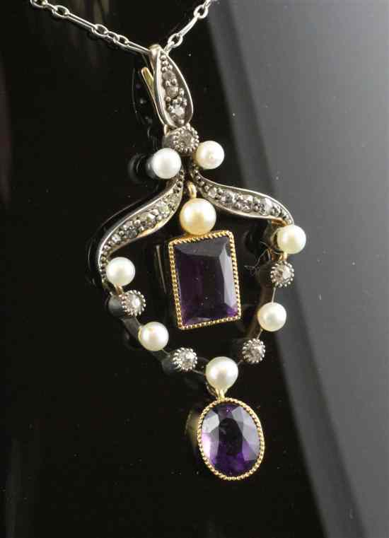 Appraisal: An Edwardian gold diamond amethyst and seed pearl pendant of