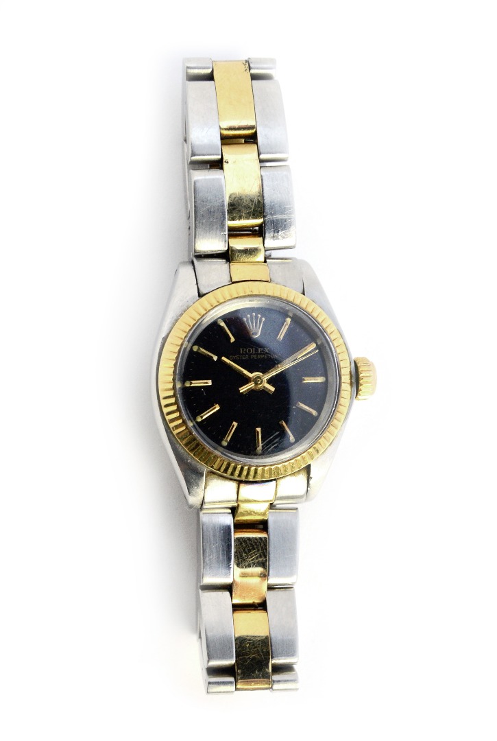 Appraisal: A lady's steel and gold automatic centre seconds wristwatch with