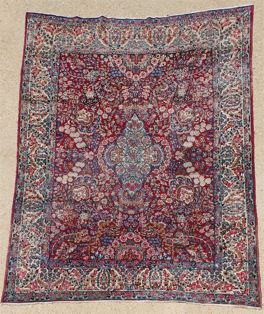 Appraisal: ORIENTAL WOOL RUG PROBABLY SAROUK blues taupe purple pinks green