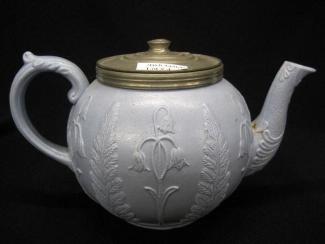 Appraisal: th Century Stoneware Teapot blue with raised decoration pewter hinged