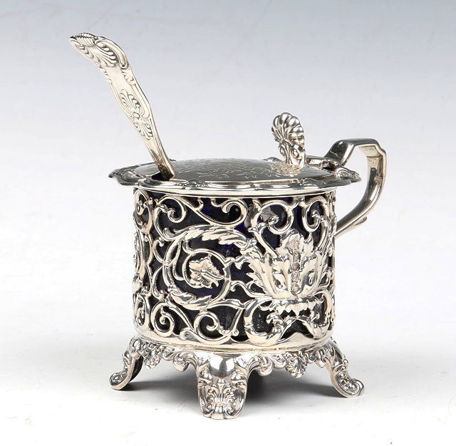 Appraisal: A VICTORIAN SILVER MUSTARD POT with pierced sides scroll and