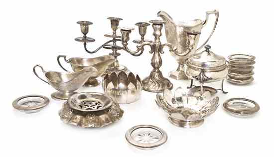 Appraisal: A Collection of Silverplate Articles comprising two candelabra a water