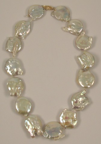 Appraisal: BAROQUE PEARL AND YELLOW GOLD NECKLACE strung with baroque white