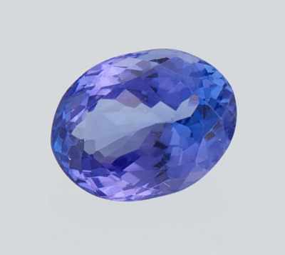 Appraisal: An Unmounted Tanzanite Weighing ct oval faceted cut