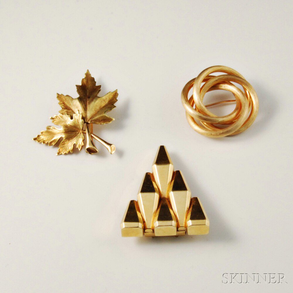 Appraisal: Three kt Gold Brooches a pair of maple leaves an