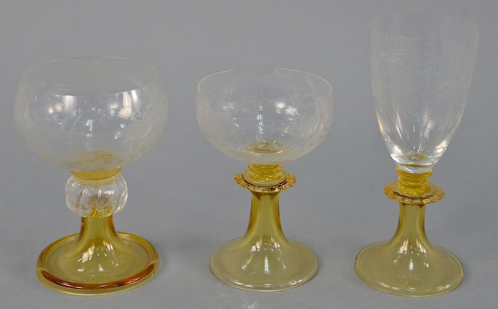 Appraisal: Set of etched glass stem glasses with amber stems twelve