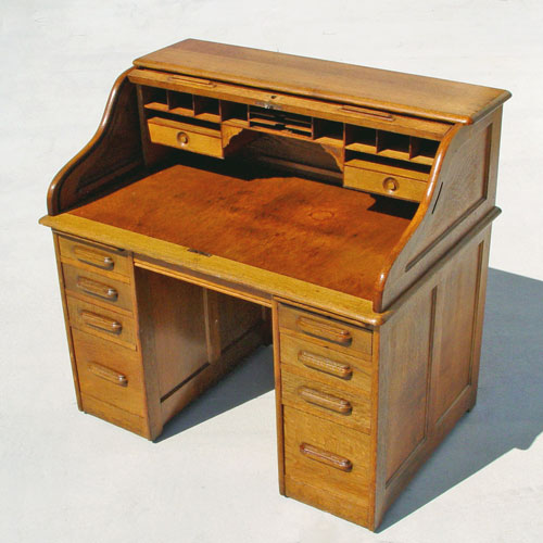 Appraisal: EARLY TH C OAK ROLL TOP DESK ''S'' curve roll