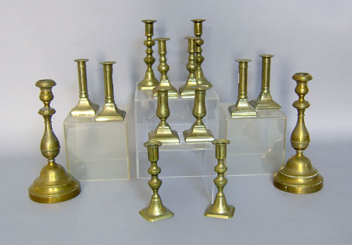 Appraisal: Seven pair of brass candlesticks tallest - h