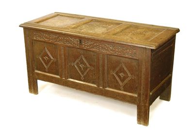 Appraisal: A Charles II joined oak panelled chest the interior with