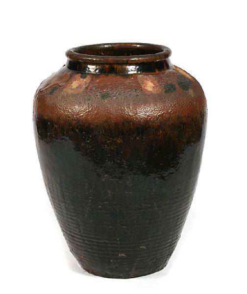 Appraisal: A brown glazed storage jar height ft diameter in