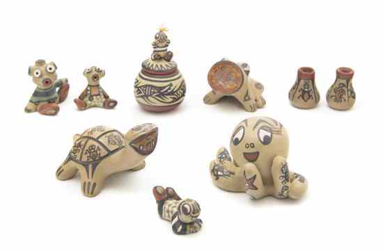 Appraisal: A Collection of Nine Santa Clara Figurines including a turtle