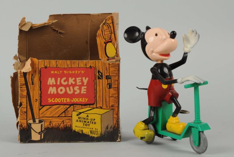 Appraisal: Walt Disney Wind-Up Scooter Jockey Toy With Box The original