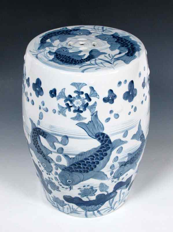 Appraisal: CHINESE GARDEN STOOL Blue decorated with koi fish Modern production